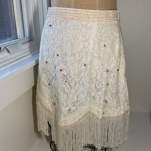 Verb Embellished Fringed Cream-colored Lace skirt with rhinestones.
